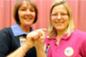 Woodmancote brownie leaders, Sue Lewis and Teresa Nolan, awarded...